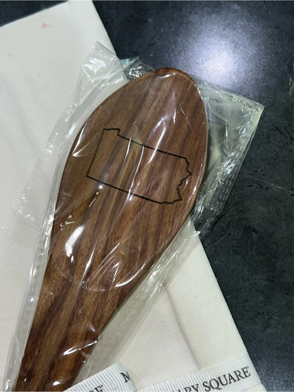 Mary Square “Pennsylvania” Cream Kitchen Towel with Natural Wood Serving Spoon